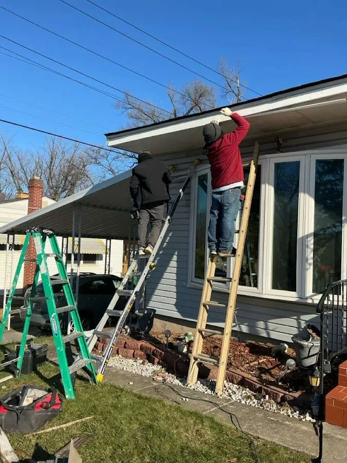 Restoration crew performing exterior repair in Worthington